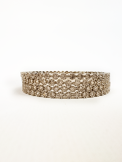 Set of 4 Silver Tone Bangles with Intricate Stone Work